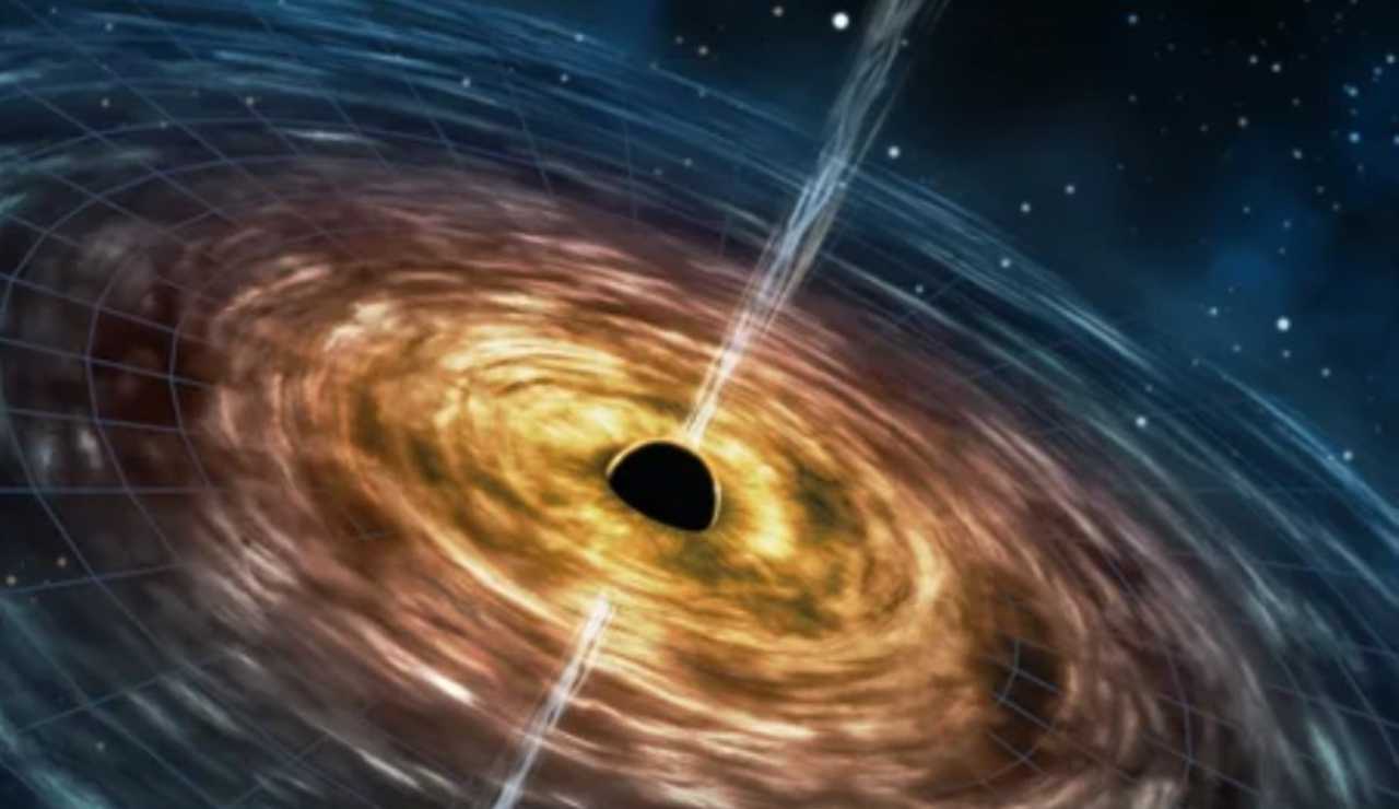 Illustrazione di un buco nero supermassiccio (Depositphotos foto) - www.sciencecue.it